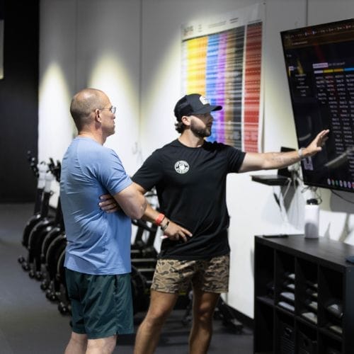 coach instructing a client